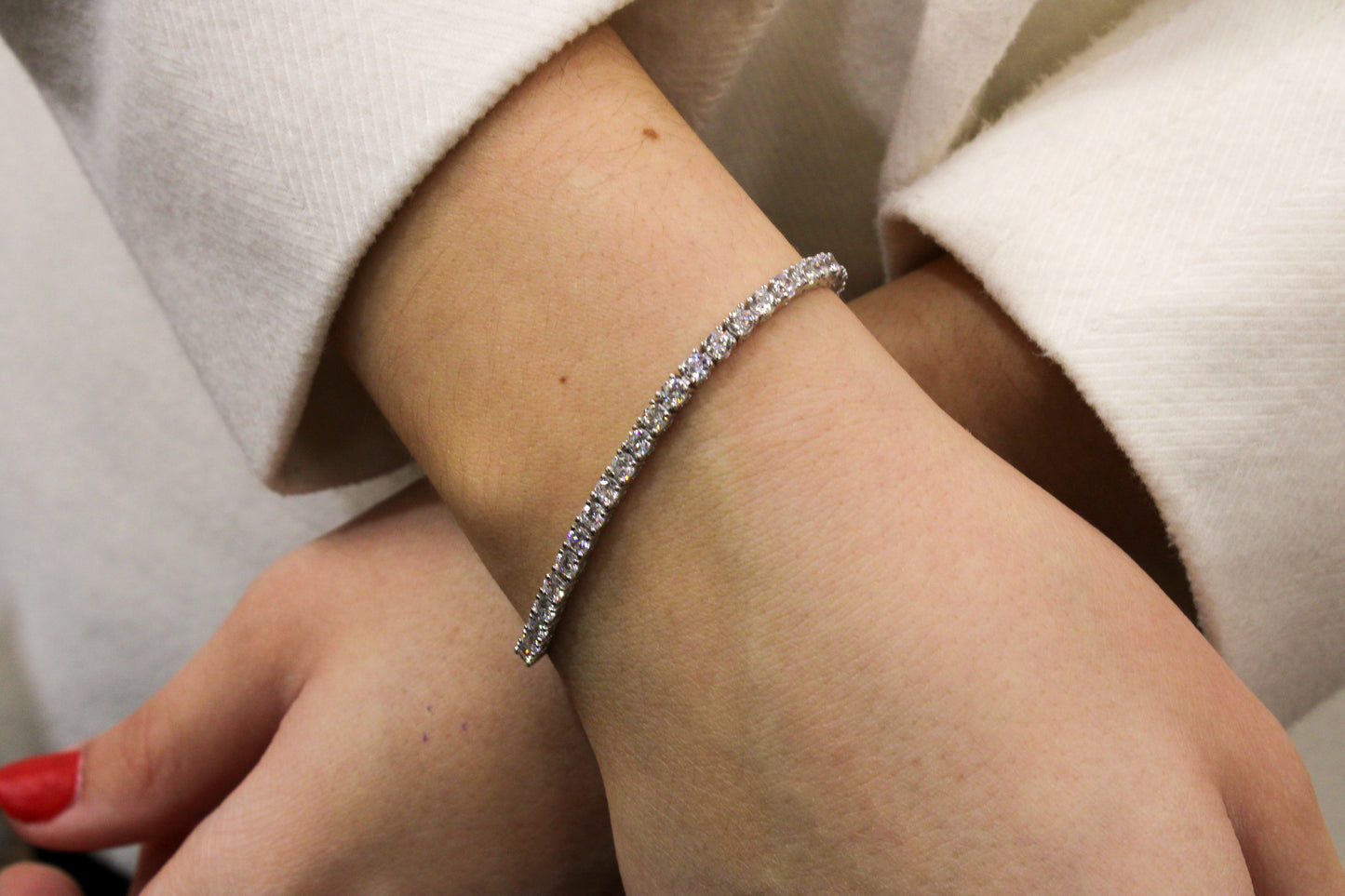 Exclusively Silver Tennis Bracelet With Lariat Style Closure.